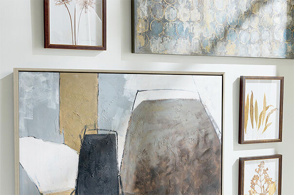 Array of artwork on a wall